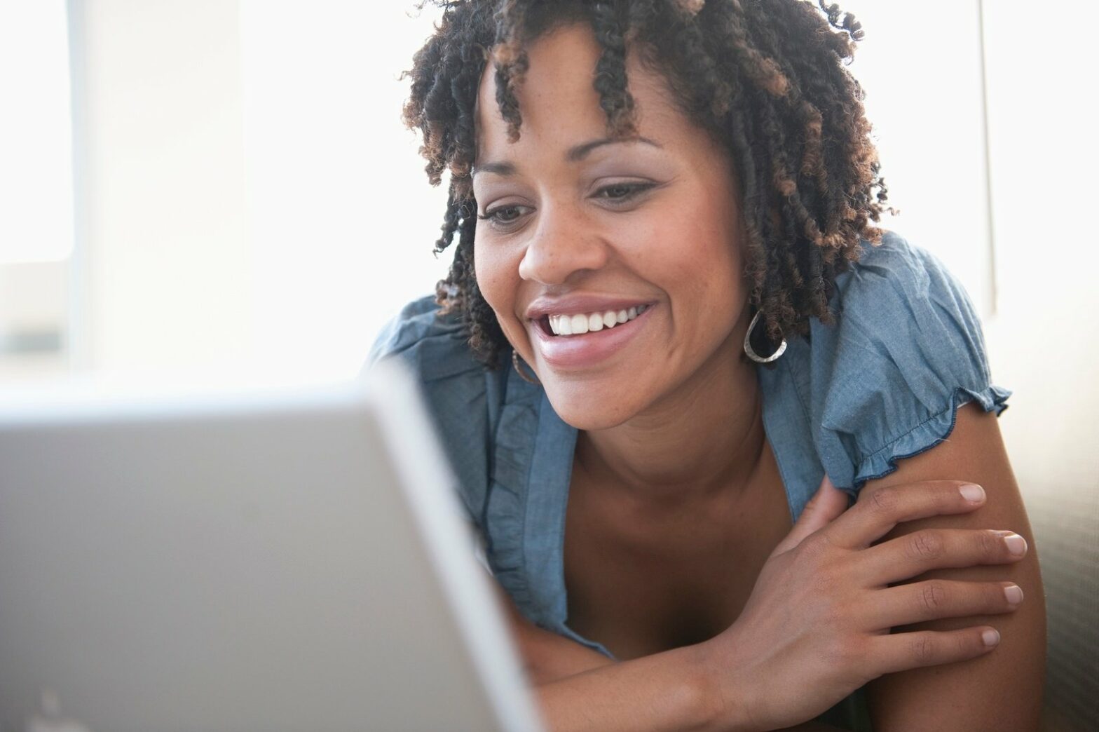 Woman looking for a job on a client's career site